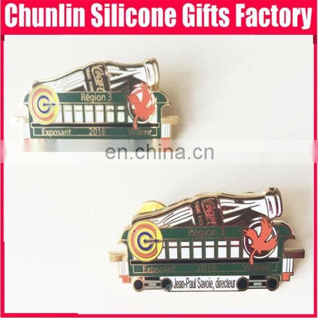 carved lapel pin with resin