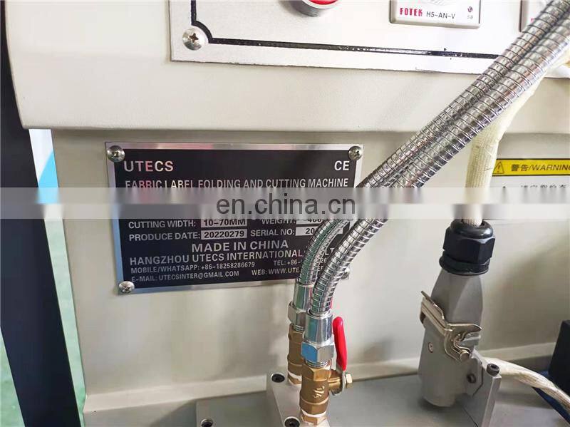US3000 multifunction Automatic hot cold knife textile grosgrain ribbon garment apparel label cut and fold machine equipment
