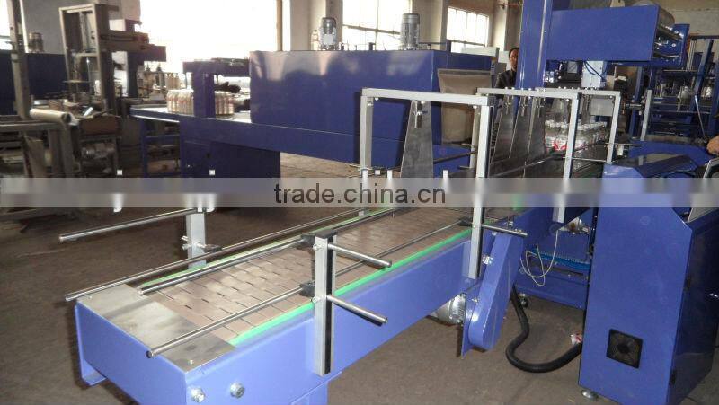 Group shrink machine for water bottles