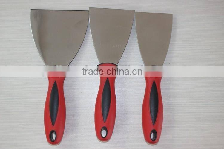 Putty knife with rubber handle