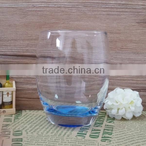 Clear egg shape glass tumbler with 400ML capacity and color bottom