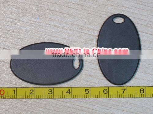 Button-Sized RFID Laundry Tag for Long Range Laundry Garment Tracking