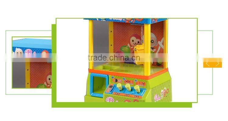 High quality plastic battery operated coin game toy catch machine