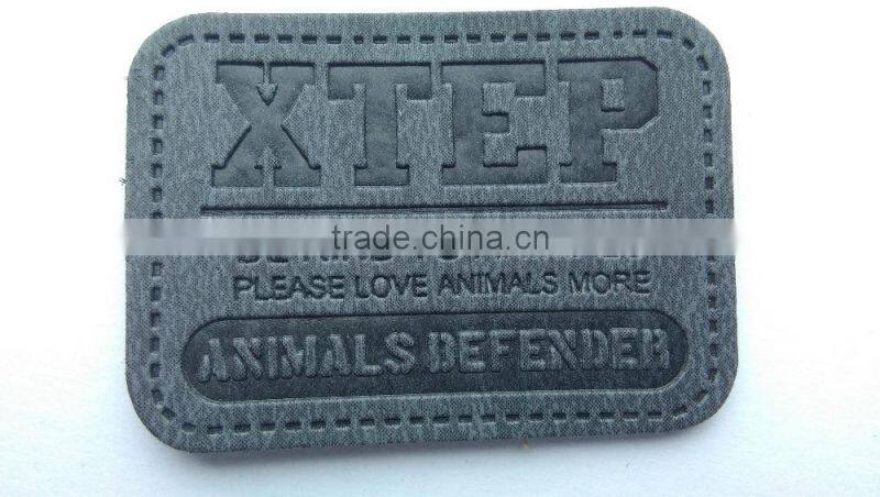 custom jeans black debossed patches