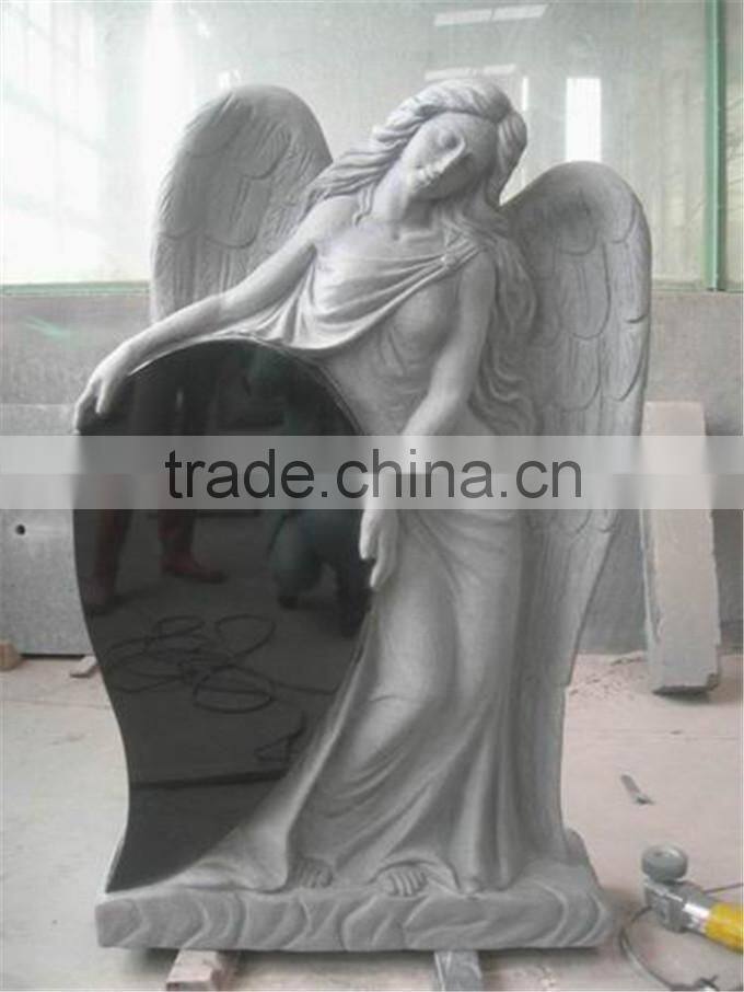 black heart shaped granite angel gravestone
