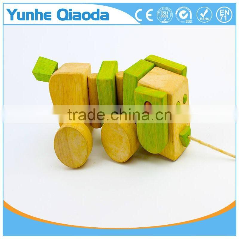 Pull Along Dog Wooden Toy wiggles as you pull they make a clicking sound and make a fun baby