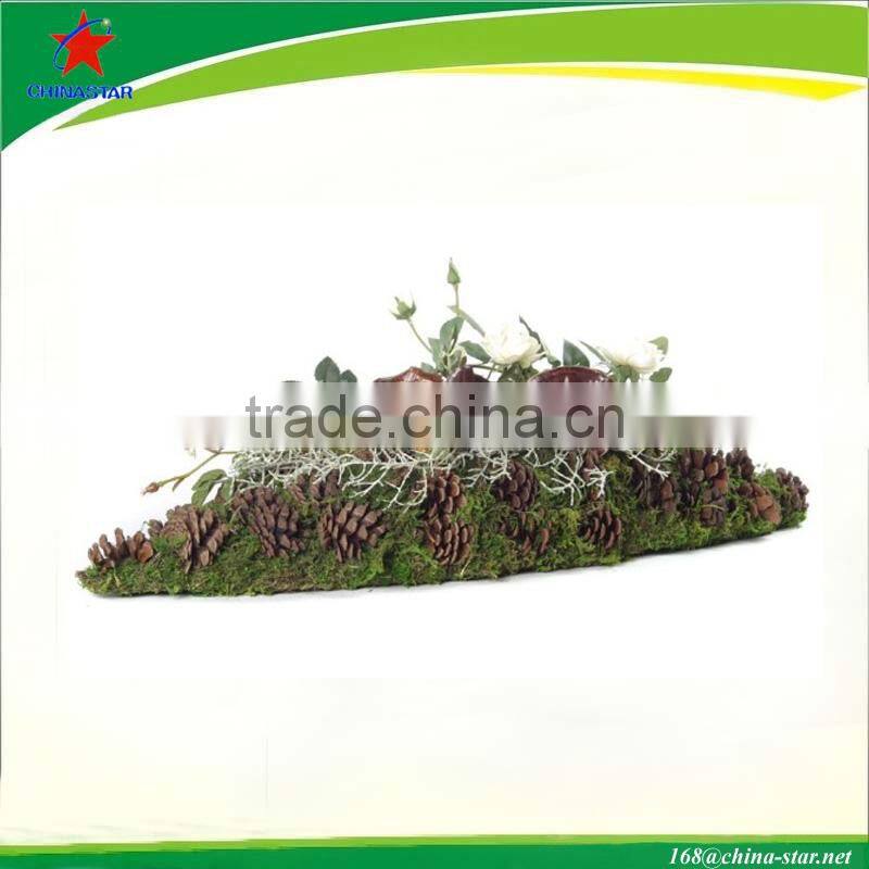 moss flower pot with pine decor