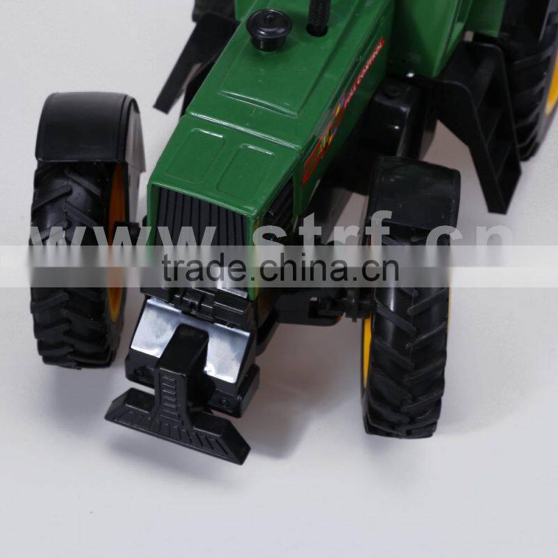 Toy Green color tractor pulling with tailer