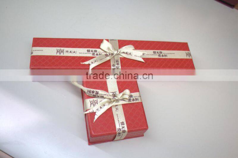 custom jewelry paper box decorated with ribbon