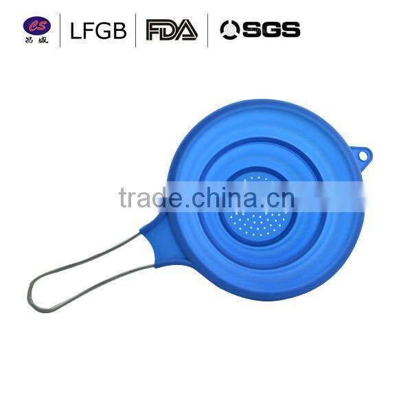 2014 New design fashionanble heat resistant silicone strainer spoon
