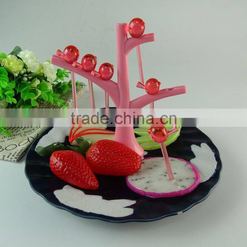 Bulk stock cheap black glazed round porcelain fruit plate with plastic stick wholesale