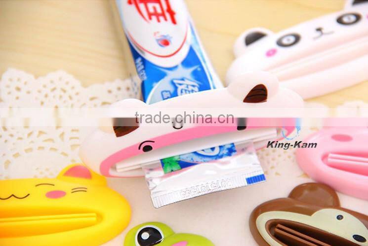hot selling plastic toothpaste tube squeezer/toothpaste dispenser,wholesale custom children automatic toothpaste dispenser