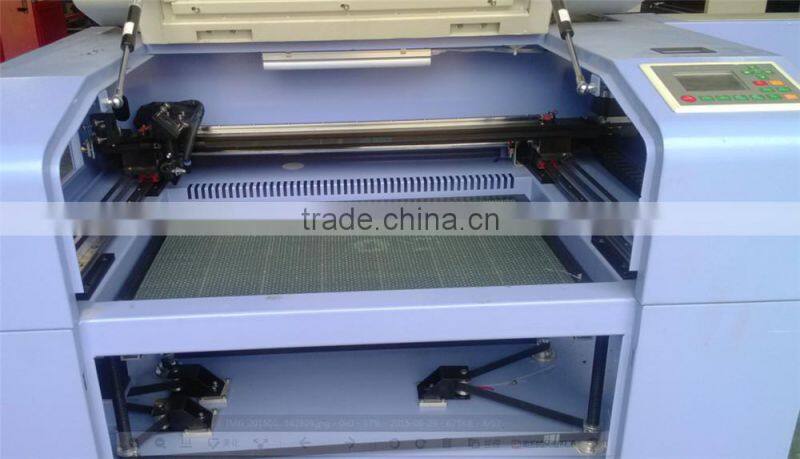 Rotary laser cutting machine with CE PC-1410LR