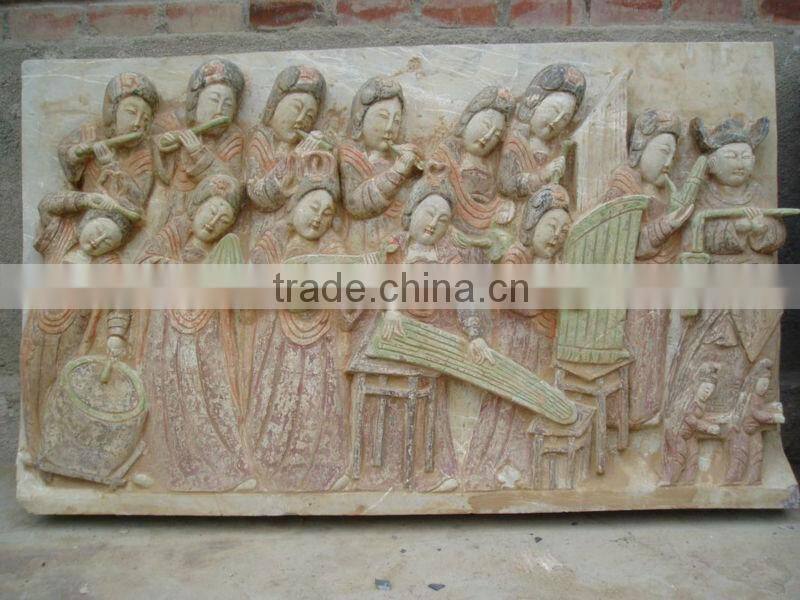 antique statue on stone