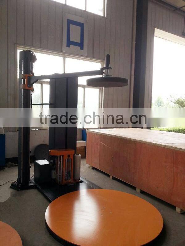 Heat shrink parcel wrapping machine