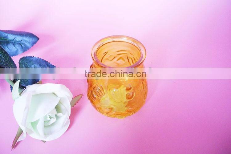 geo cut glass candle jar with metal handle