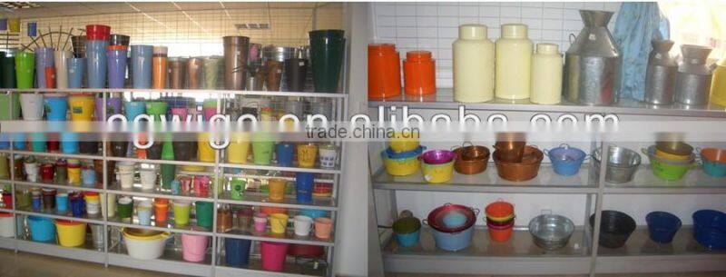 garden light green metal watering can