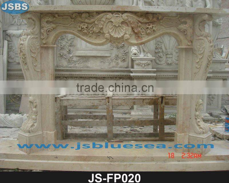Stone carving of yellow marble fireplace mantel