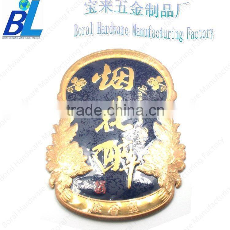 Printed screw hold metal plate for brand logo