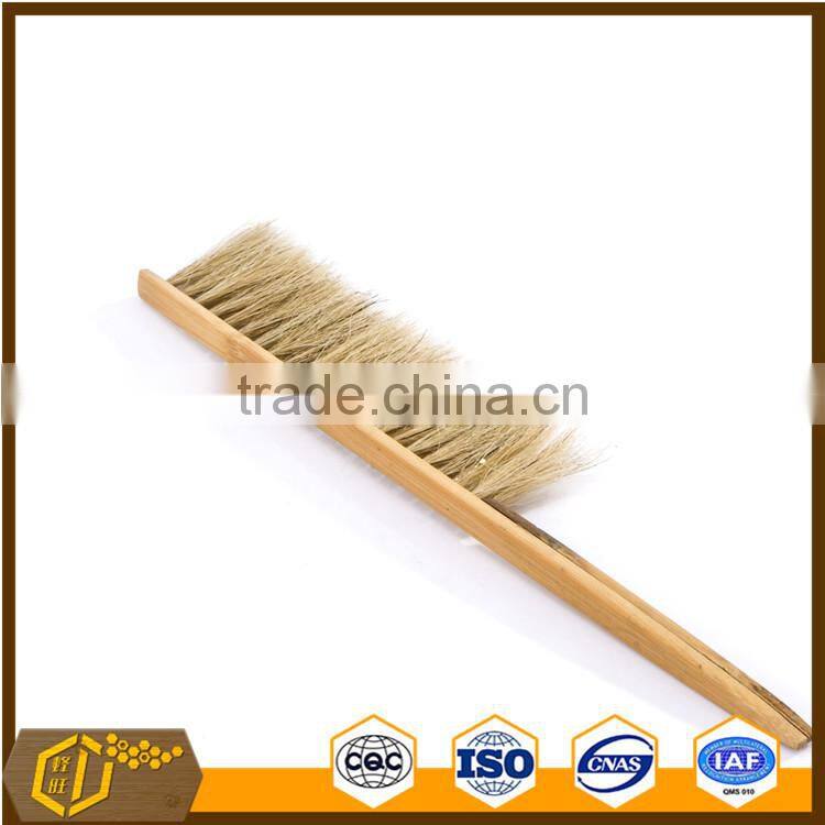 wooden hand beekeeping beehive frame cleaning