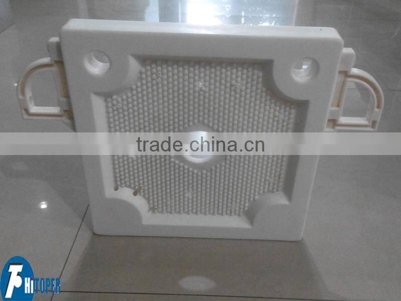 Filter press plate used in the dewatering treatment of water purification