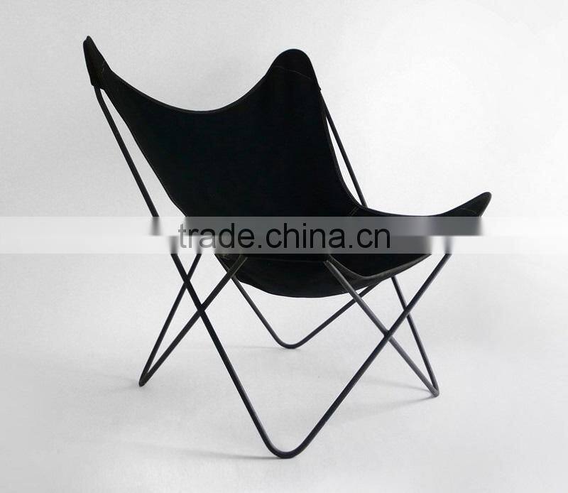 BKF Butterfly chair in living room chair frame with black leather