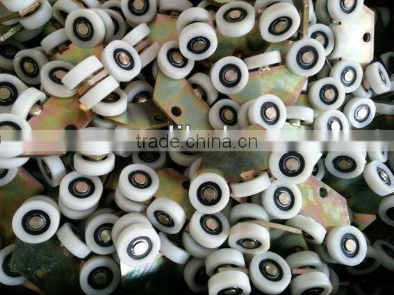 sliding cantilever gate roller