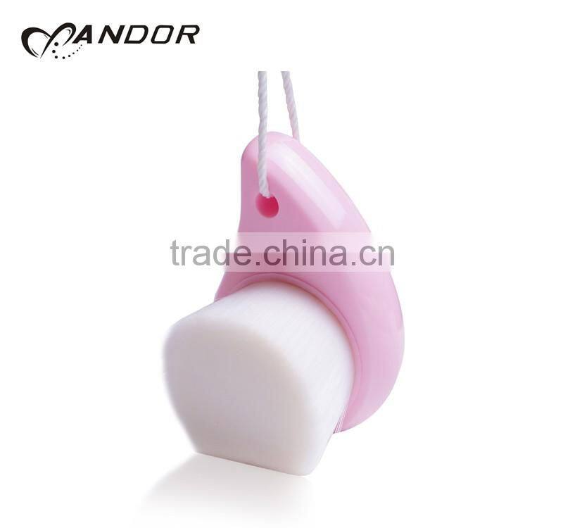 Patent design pink handle andor face cleansing brush