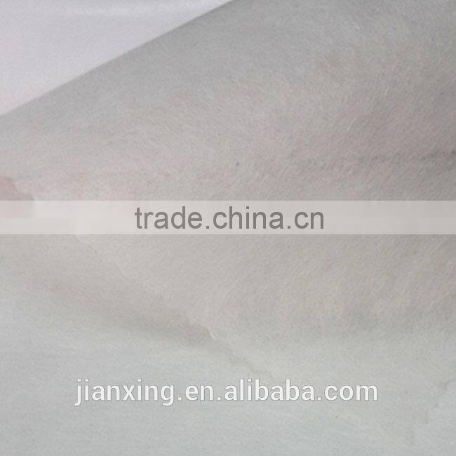 Hot and cold water soluble adhesive interlining for garment embroidery