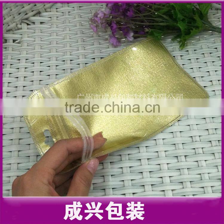 hanging packaging bag/nylon zipper pouch/golden silver color packing sleeve for mobile phone cover