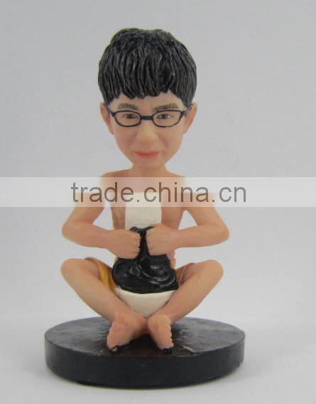 cute boy sitting small resin figurine