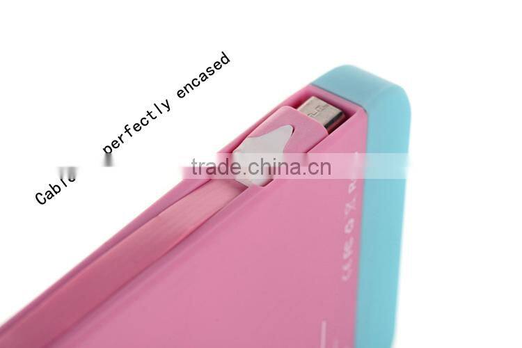 2014 High quality built in cable 5000mah silicon powerbank
