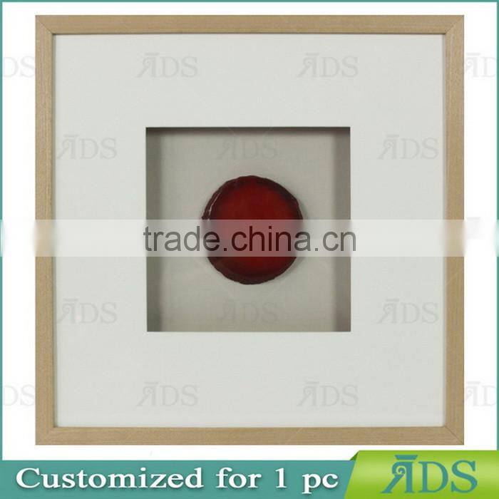 Shadow Box Frame With A Light Gray Wash And Encasing Colorful Natural Agate Under Glass