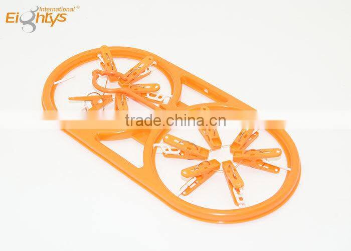 hanger for a household necessity with two oval cloth hanger