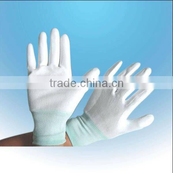 Black seamless knitted gloves with pu coated palm