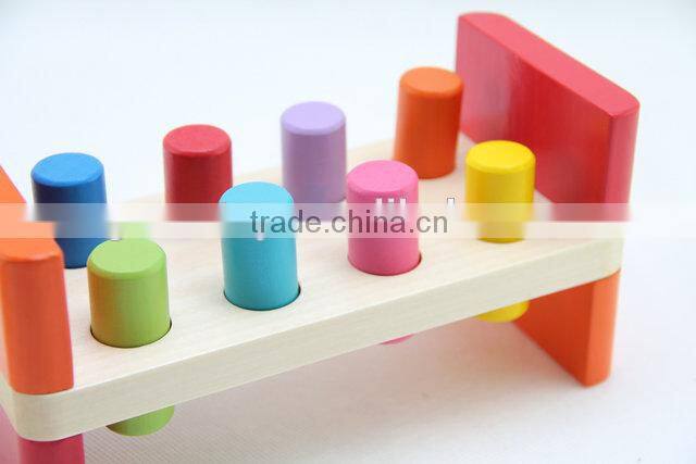 Wooden workbench toy with wooden hammer