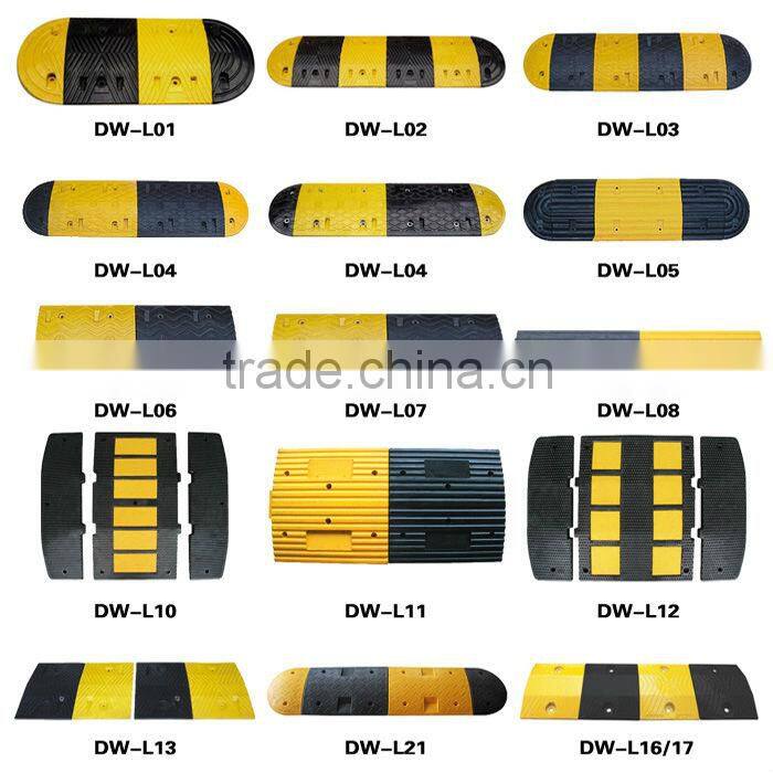 Yellow and black rubber road speed humps