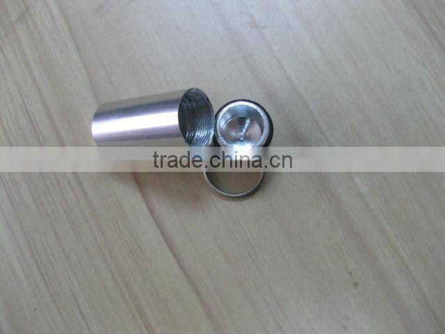 pill holder keychain with a pen