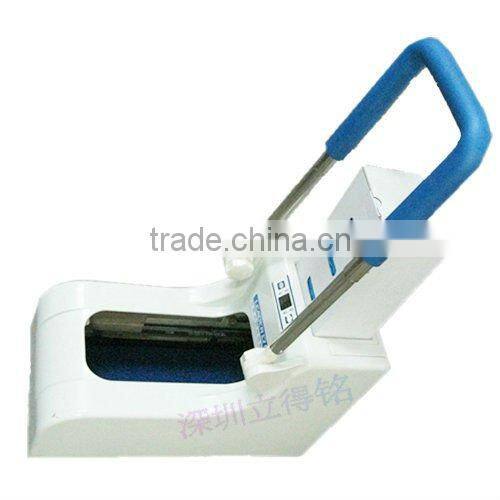 handle shoe cover dispenser