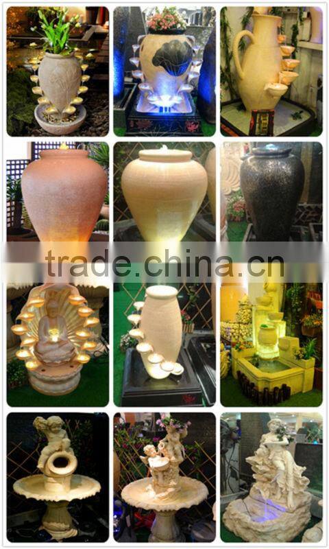 flowing water yellow sandstone fountain