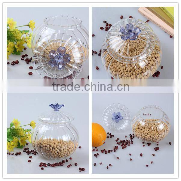 china hot sale factory fashionable design glass food container jar with flower shape lid painted blue