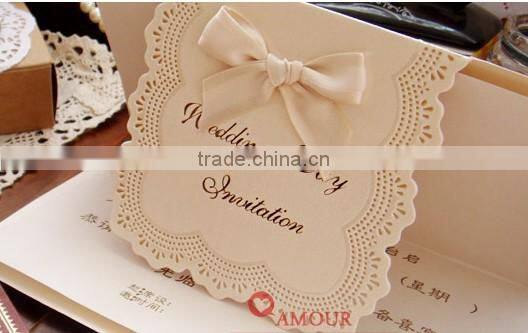 cream doir bow for invitation