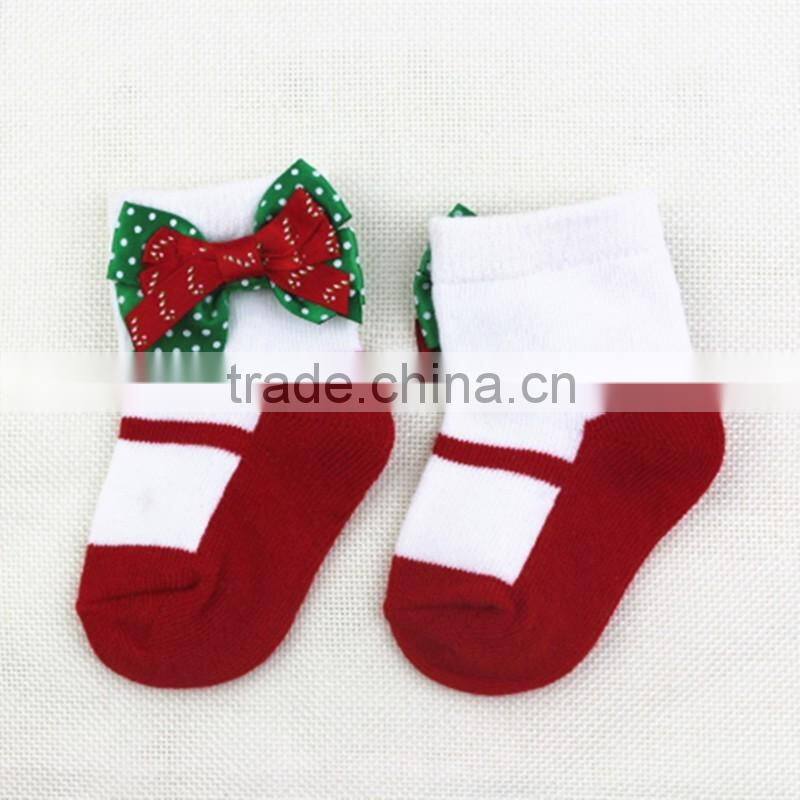 Customized happy cute Christmas baby socks with bowknot for holiday made of cotton