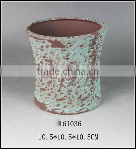 green glazed stoneware flower pot