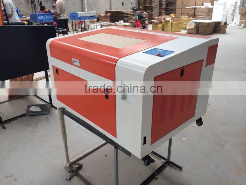 50W/60W optional LY CO2 laser wood engraving cutting machine 6040,Manual/Electric Table control mode,Can Applicable Industry