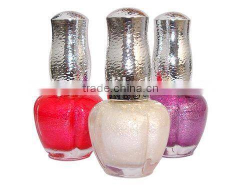 Small empty nail polish bottles with brush