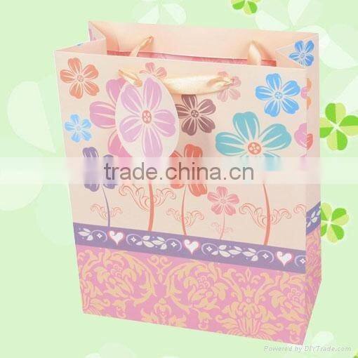 2013 wholesale beautiful and eco-friendly coated paper gift/candy bag --size22*10*24cm