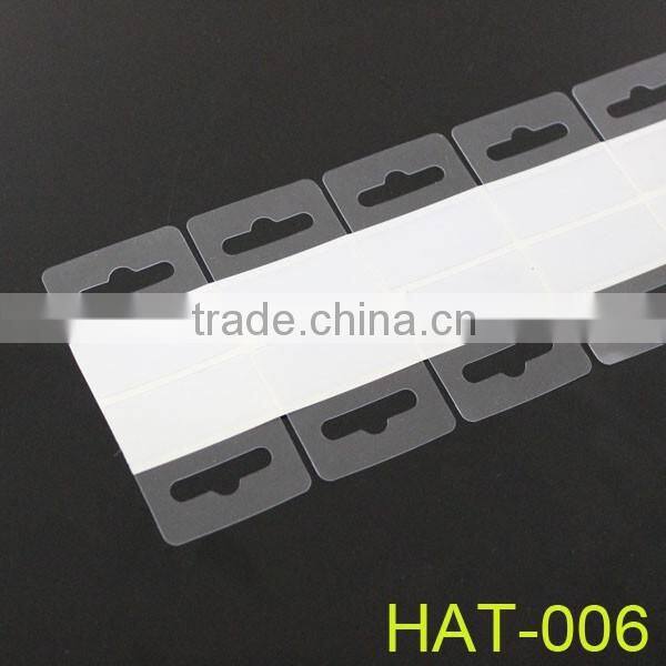 displaying plastic adhesive pet hook in supermarket