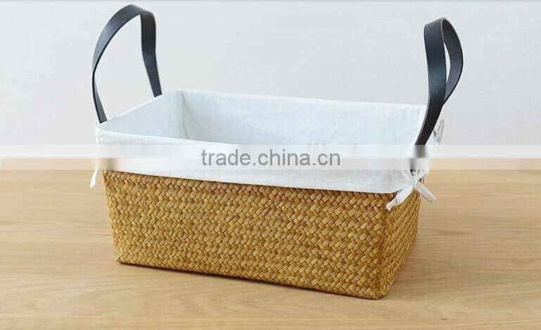 basket made of natural straw seagrass for housewaring with handle and lining