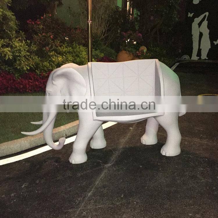 Fiberglass elephant chair sculpture